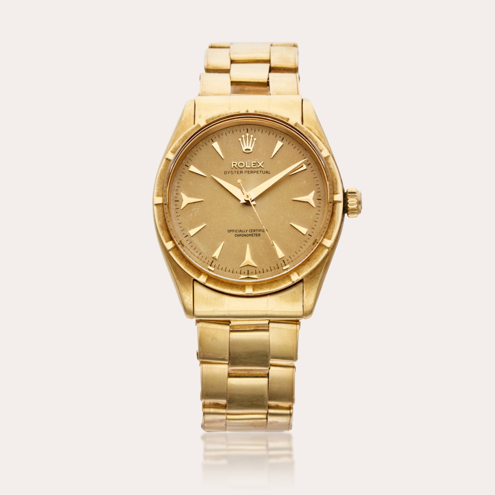 Rolex Reference 6569 Oyster Perpetual | A yellow gold automatic wristwatch with bracelet, Circa 1956