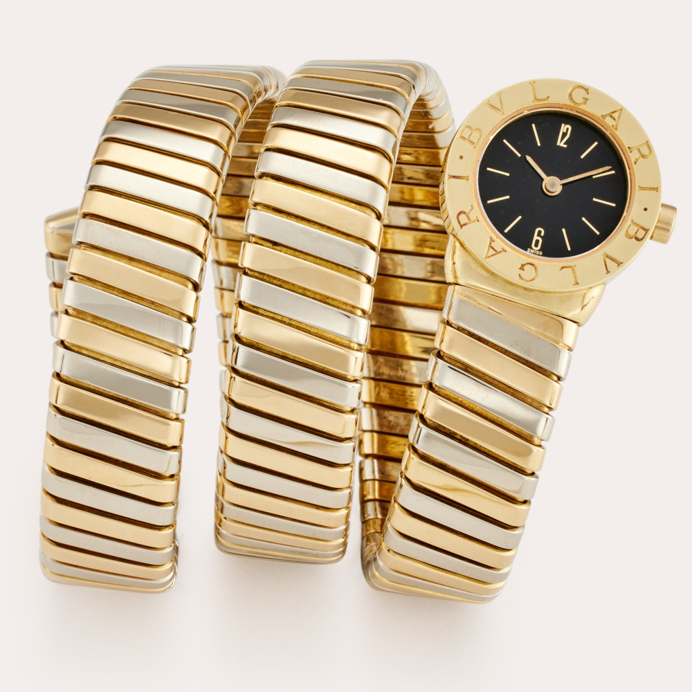 Bvlgari Tubogas | A yellow and white gold expandable bracelet watch, Circa 2000