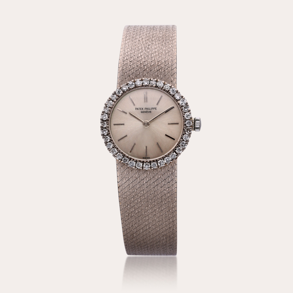Patek Philippe Reference 3355/1 | A white gold and diamond-set bracelet watch, Circa 1968