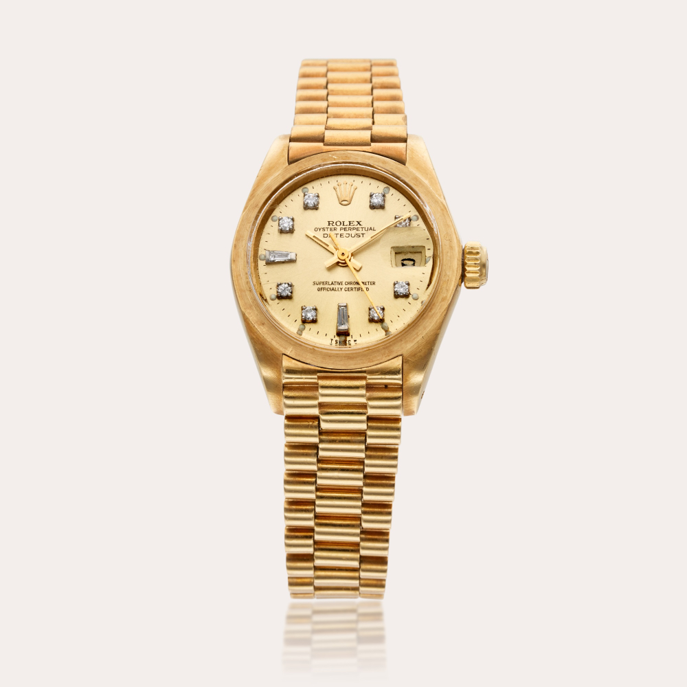 Rolex Reference 6917 Datejust | A yellow gold and diamond-set automatic wristwatch with date and bracelet, Circa 1982
