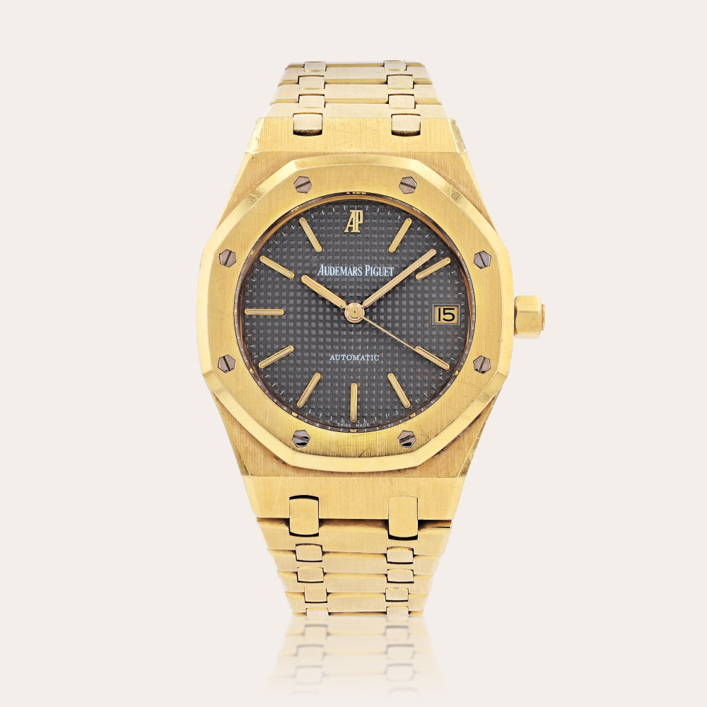 Audemars PiguetRoyal Oak reference 14790BA.OO.0789BA.01 Montre bracelet en or jaune avec date | Yellow gold wristwatch with date and bracelet Vers 1994 | Circa 1994