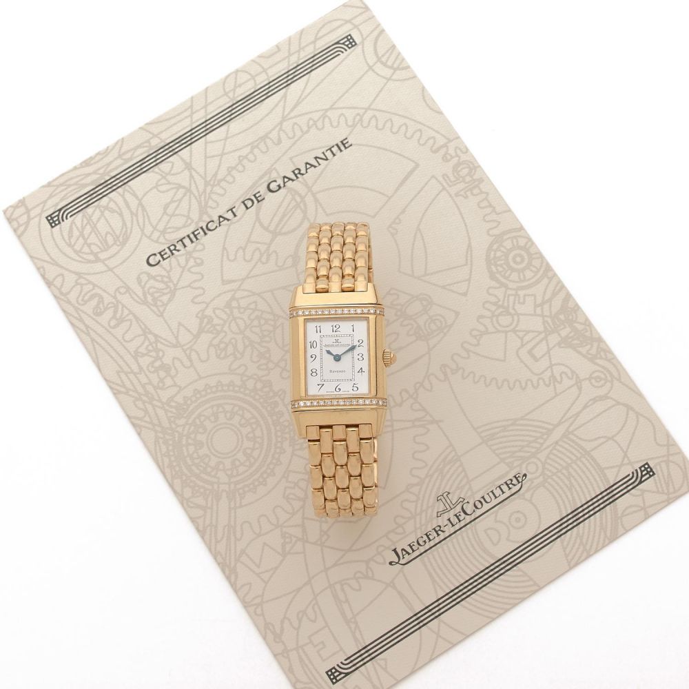 JAEGER LECOULTRE REVERSO LADY A gold 18K and diamond quartz reversible lady's watch by Jaeger Lecoultre, circa 1998.
