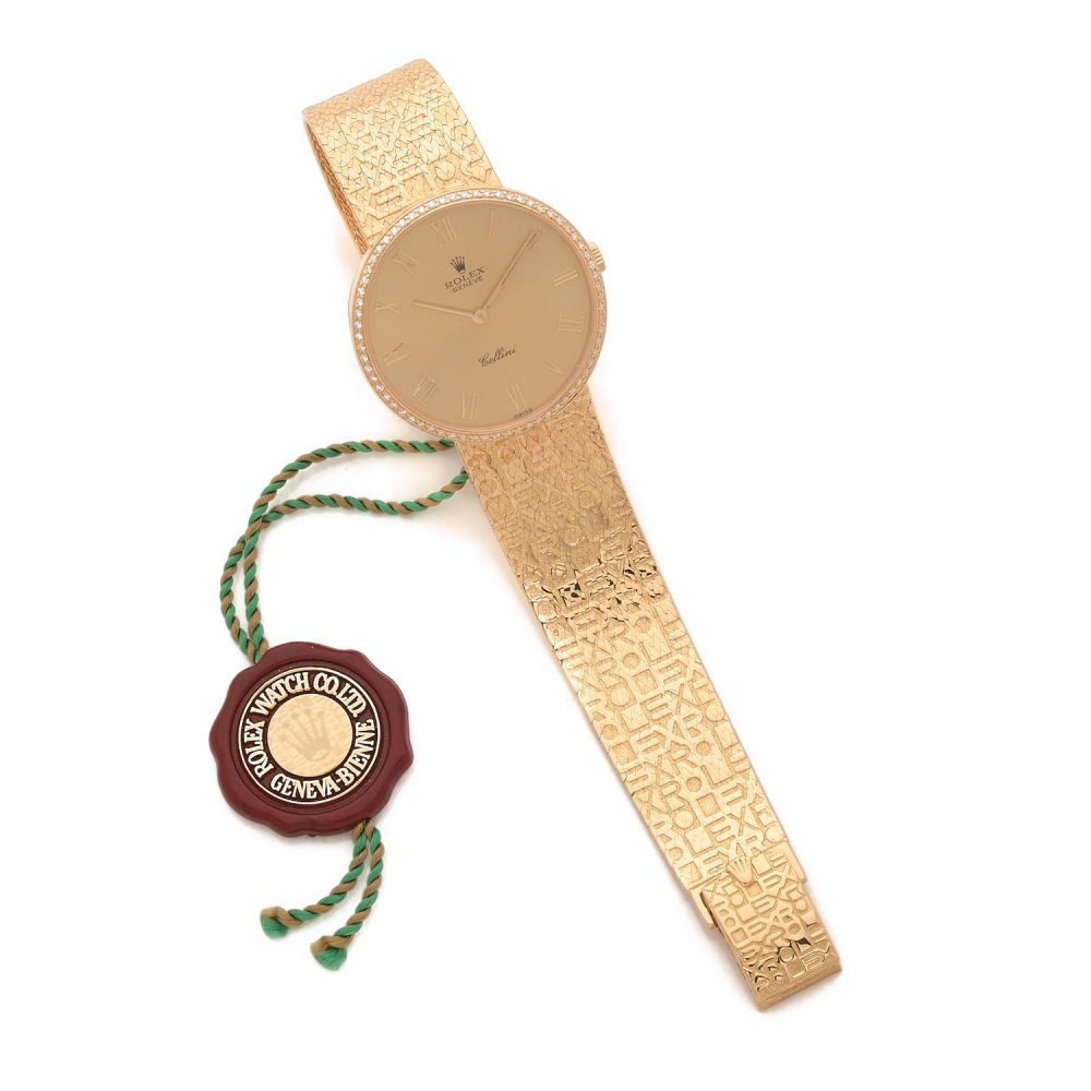 ROLEX CELLINI JUBILEE REF - 5134/8 VERS 1988. Montre bracelet en or jaune 18K. BOITIER: rond avec lunette sertie de diamants. C...