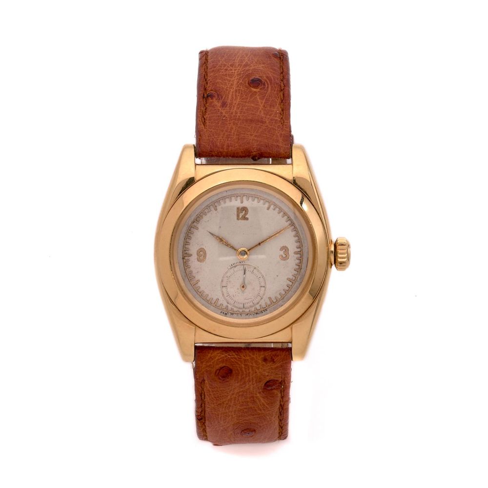 ROLEX OYSTER PERPETUAL CHRONOMETER. BUBBLE BACK. REF. 3130. A gold self winding wristwatch by Rolex, from the 30's.