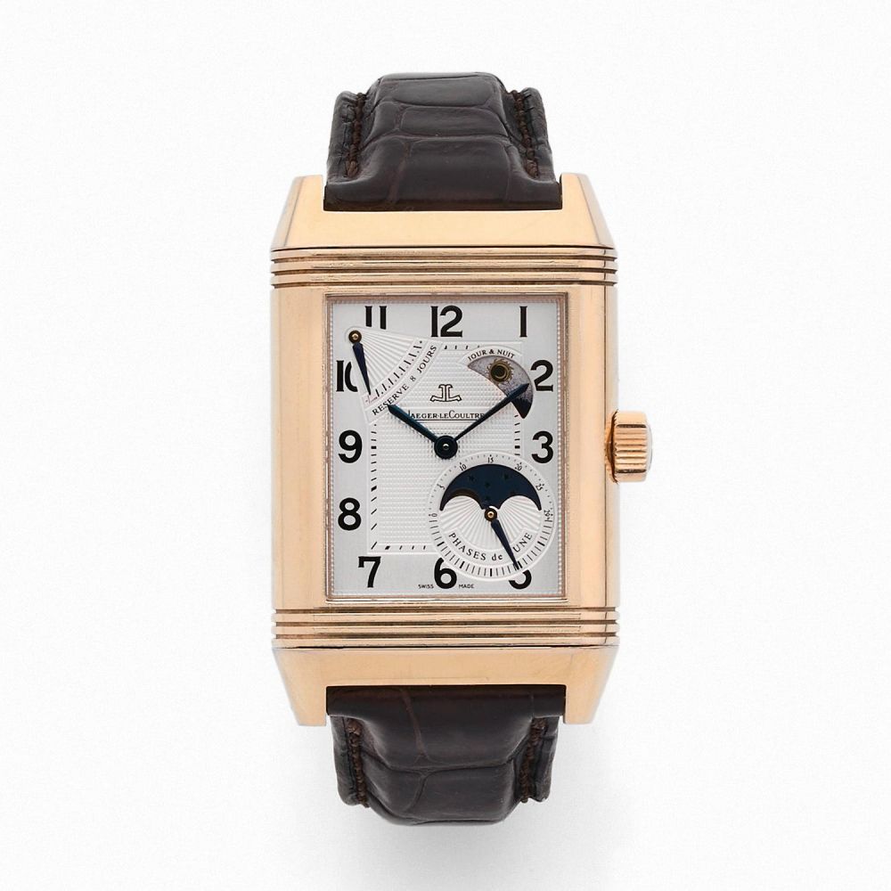 JAEGER LECOULTRE REVERSO GRANDE SUN MOON. REF. 240.2.27 A pink gold manual winding reversible wristwatch by Jaeger LeCoultre.