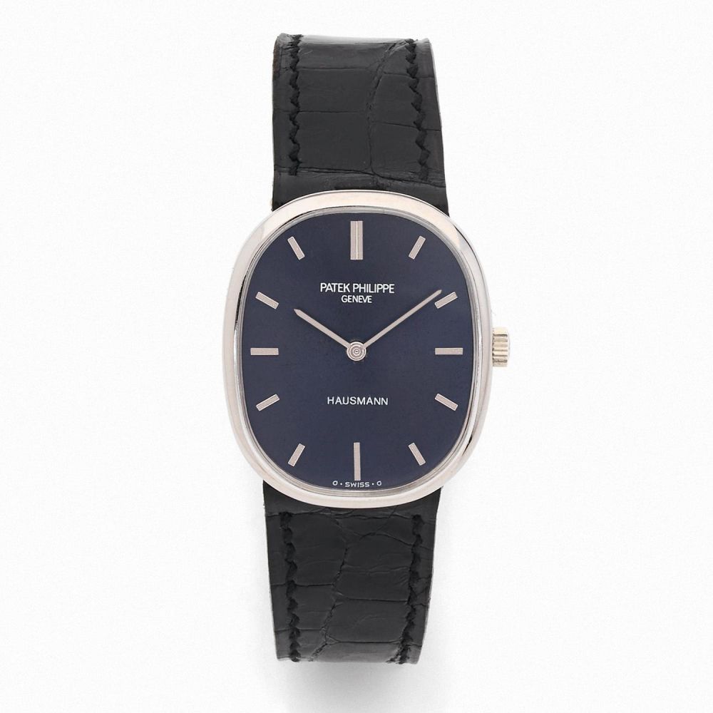 PATEK PHILIPPE DOUBLE SIGNATURE HAUSMANN ELLIPSE. REF. 3648. A white gold manual winding wristwatch by Patek Philippe, retailed by H...