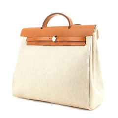 Sold at Auction: HERMES CHANGEABLE 'HERBAG PM' IN TWO SIZES